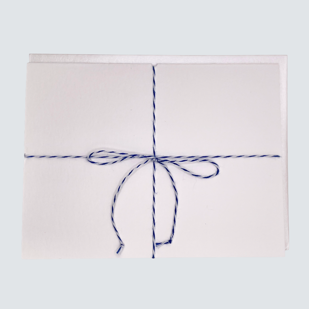 Folded handmade “Happee Birthdae” card with twine and rose gold foil. A magical birthday card for anyone who loves fun details.