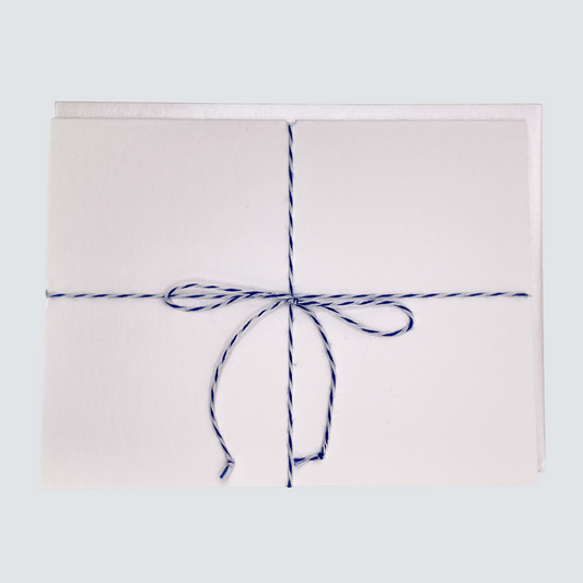 Folded handmade “Happee Birthdae” card with twine and rose gold foil. A magical birthday card for anyone who loves fun details.