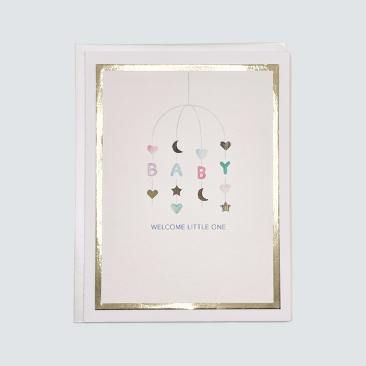 Handmade neutral baby card with watercolor mobile artwork and gold foil frame, blank inside.