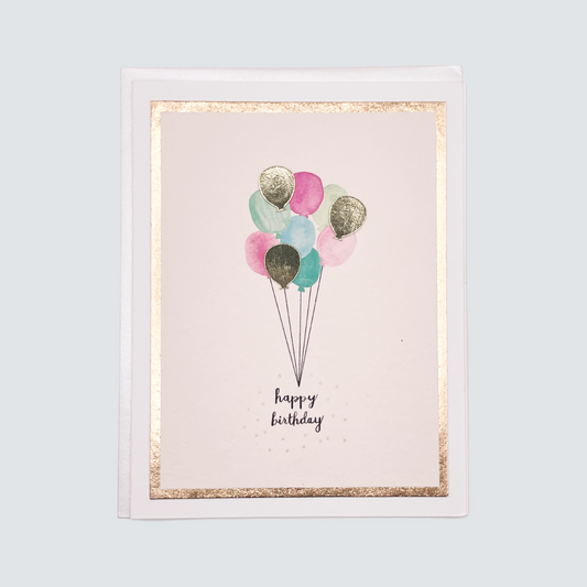 Handmade birthday balloons card with watercolor balloons and rose gold foil accents, blank inside.