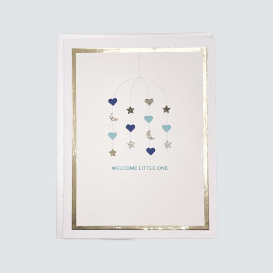 Handmade blue baby card with watercolor mobile design and gold foil border, blank inside.