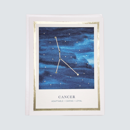 This image features a beautifully crafted Cancer Zodiac Card, perfect for astrological enthusiasts. The card showcases a stunning hand-watercolored artwork of a serene blue sky adorned with golden stars, emphasizing the Cancer sign.