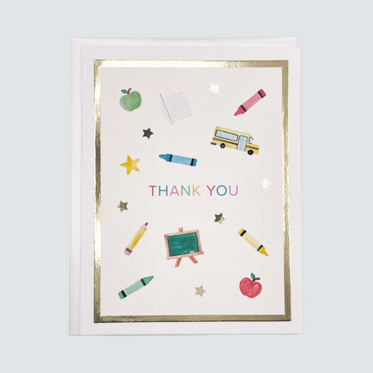 Handmade teacher thank you card with watercolor school-themed illustrations and gold foil details, blank inside.