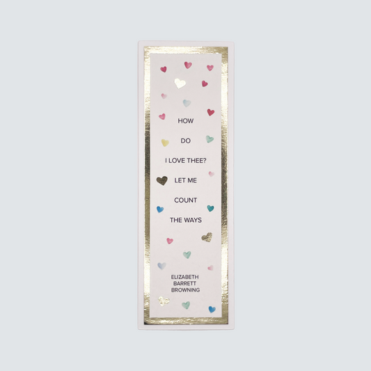 A bookmark with a quote 'How Do I Love Thee?' on a white background, embellished with gold foil and heart illustrations.