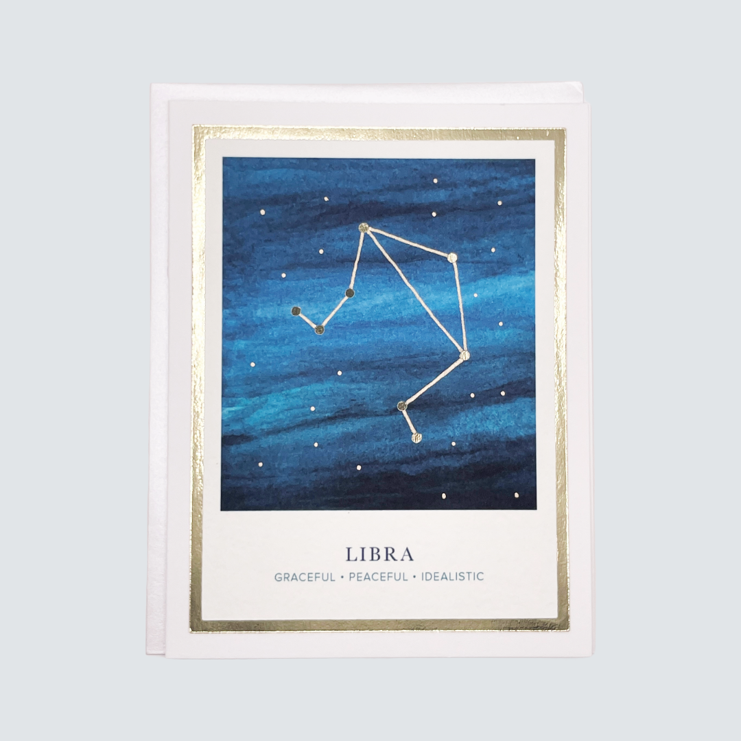 The image features a Libra Zodiac Card with a serene and artistic depiction. The card showcases a giclée print of hand-watercolored artwork, highlighting the Libra constellation against a deep, blue celestial background.