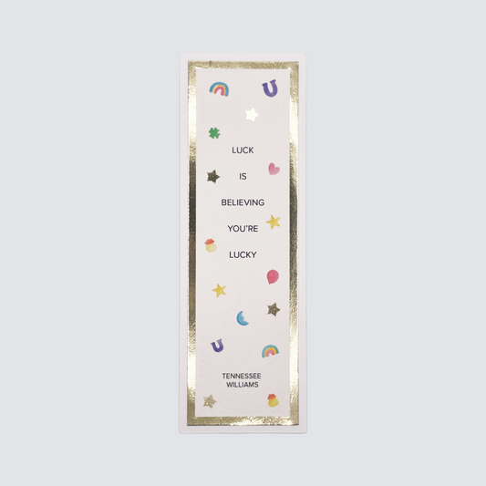Handmade bookmark with ‘Luck is Believing’ quote, gold foil accents, and watercolor artwork on premium FSC-certified cardstock.