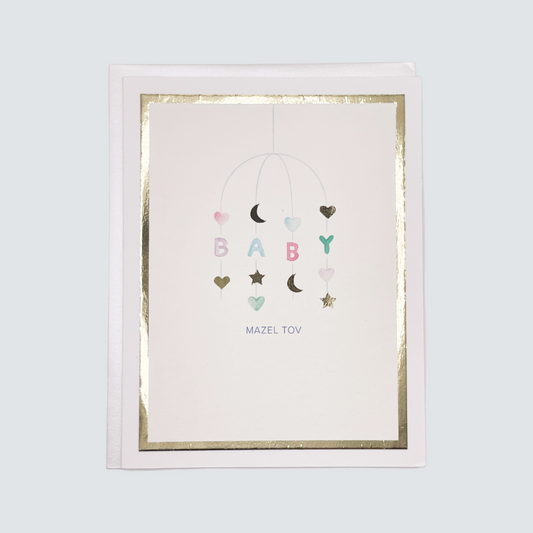 Handmade Mazel Tov baby card with watercolor artwork and gold foil border, blank inside.