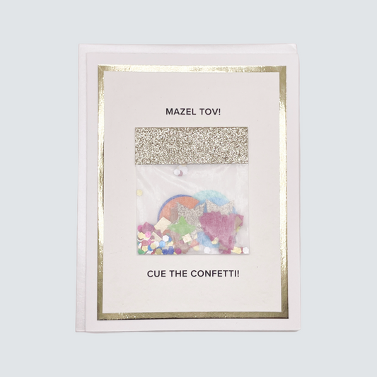 Handmade Mazel Tov confetti card with gold foil and confetti packet, blank inside on FSC-certified cardstock.