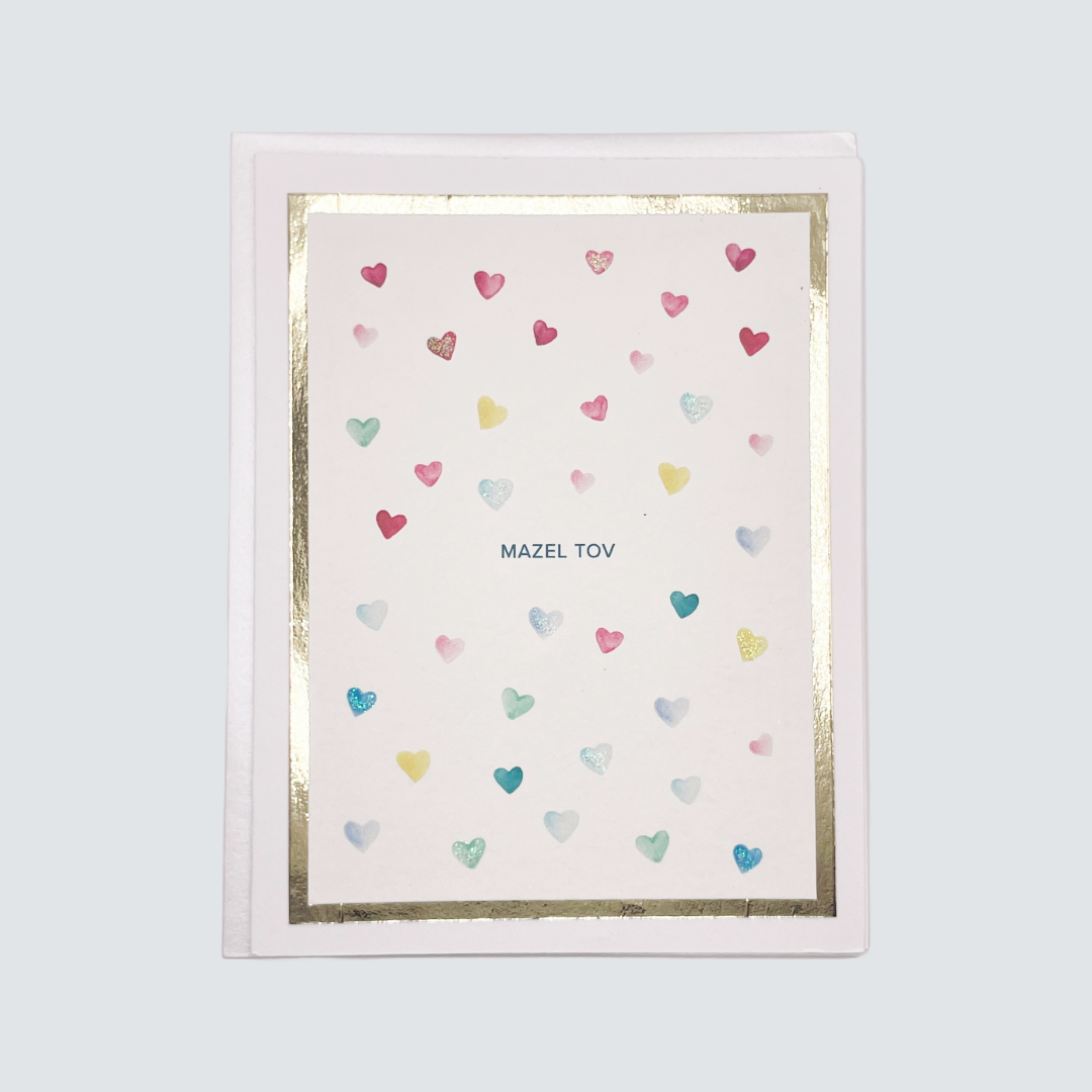 Handmade Mazel Tov card with watercolor heart design and gold foil border, blank inside.