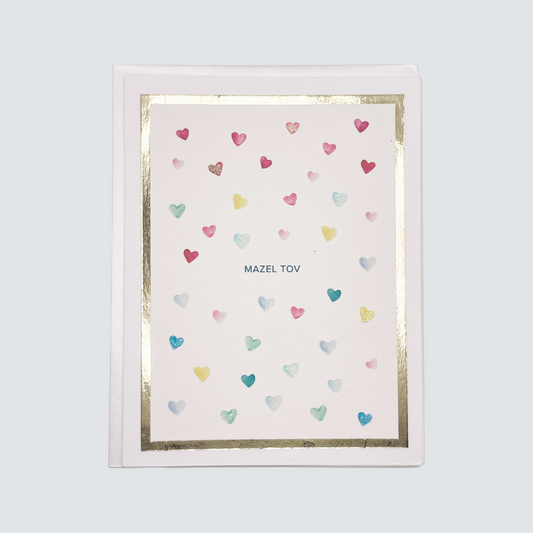 Handmade Mazel Tov card with watercolor heart design and gold foil border, blank inside.