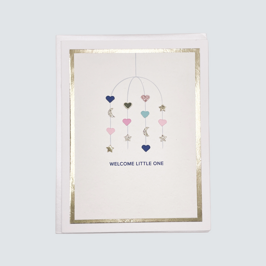 Handmade multicolor baby card with watercolor mobile design and gold foil accents, blank inside on FSC-certified cardstock.