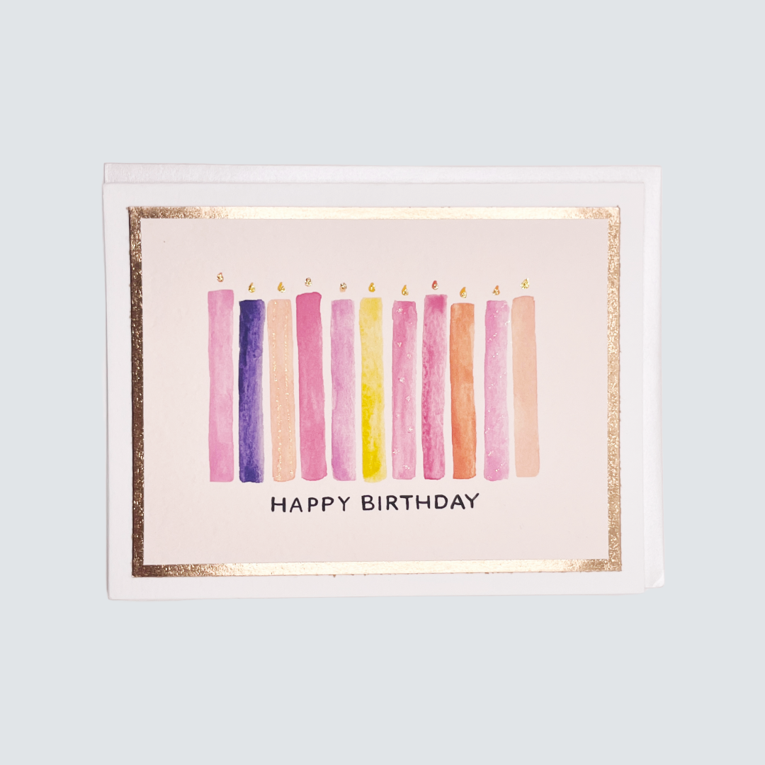 Handmade pink and purple birthday candles card with watercolor and rose gold foil border, blank inside.
