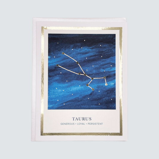 Handmade Taurus zodiac constellation card with watercolor night sky and gold foil details, blank inside on premium FSC-certified cardstock.