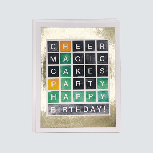 Handmade Wordle-themed birthday card with colorful letter tiles and gold foil accents, blank inside.