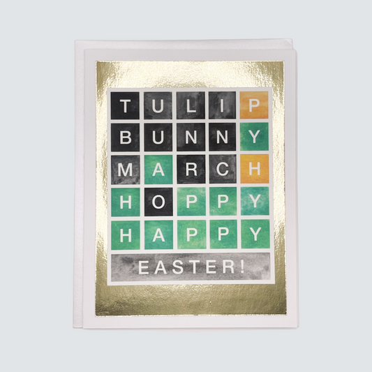 Handmade Wordle Easter card with colorful letter tiles and gold foil border, blank inside.