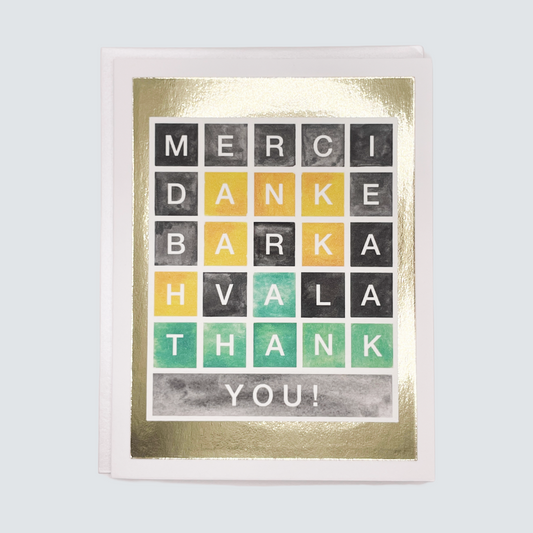 Handmade Wordle-themed thank you card with colorful grid design and gold foil border, blank inside.