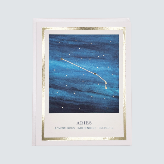 Handmade Aries zodiac constellation card with watercolor night sky and gold foil details, blank inside.