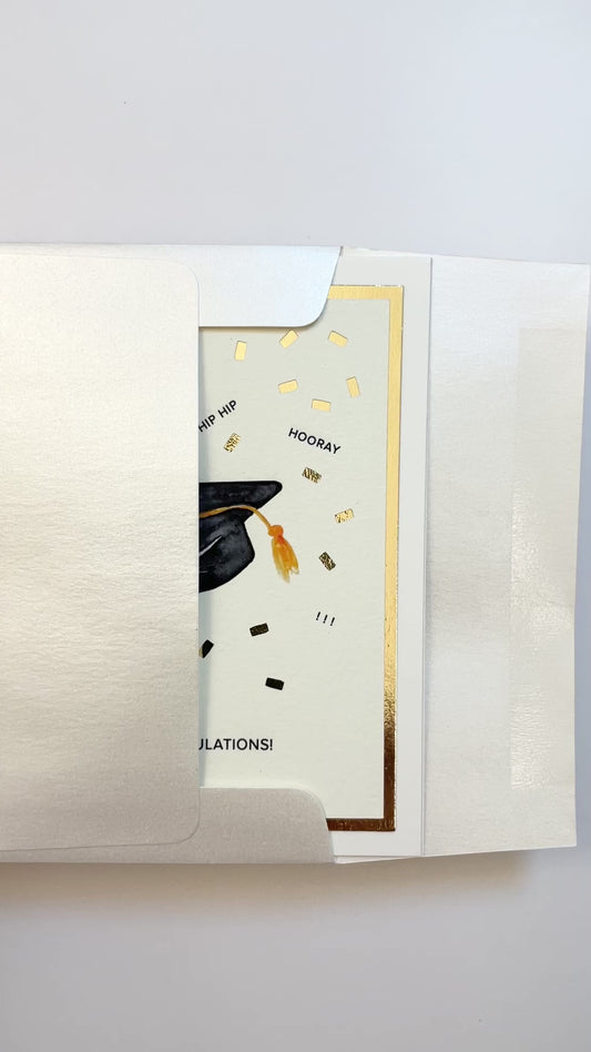 Handmade graduation card with watercolor cap and confetti design. A festive way to say congrats to your favorite graduate.