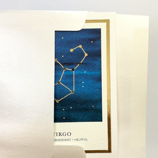 Handmade Virgo zodiac constellation card with watercolor background and gold foil accents, blank inside on FSC-certified cardstock.
